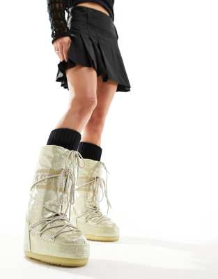 Moon Boot high ankle snow boots in gold ASOS