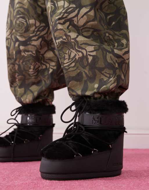 Moon Boot Icon low faux fur boots in black | ASOS