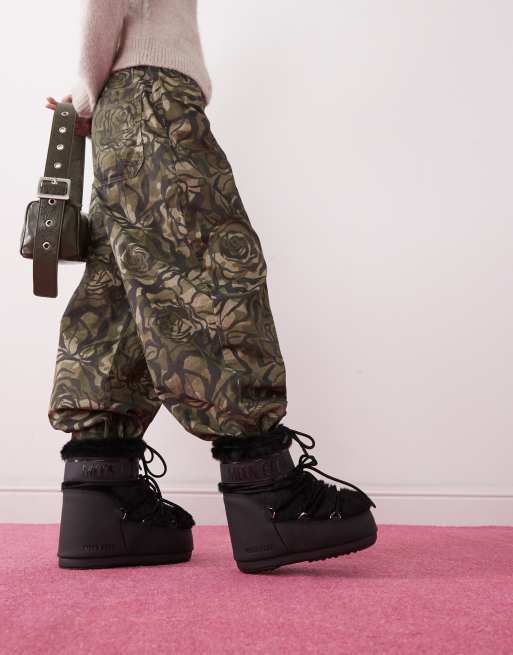 Moon Boot Icon low faux fur boots in black | ASOS