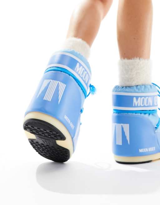Moon Boot mid ankle snow boots in blue ASOS