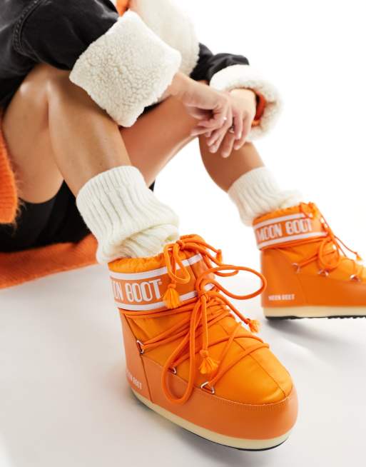 Orange on sale fur boots