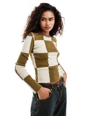 Moon River checkerboard hole-knitted ribbed top in olive