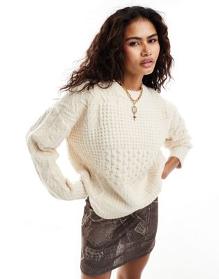 Moon River crew neck long sleeve patchwork knitted jumper in ivory
