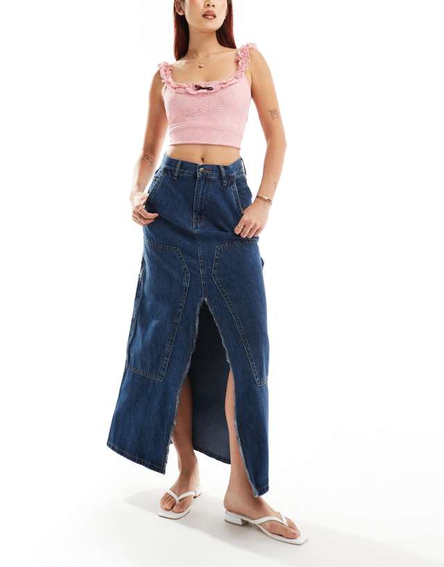 Moon River - front slit denim midi skirt in mid blue