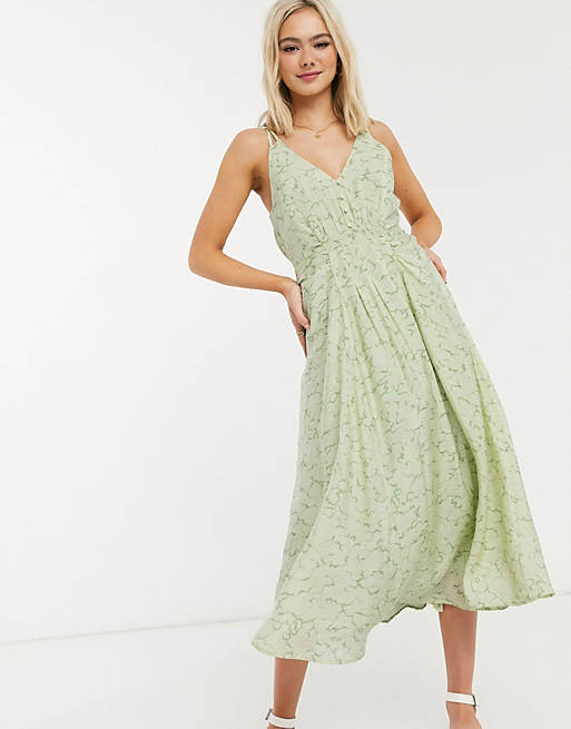 Moon River – Limonkowa sukienka midi z marszczonym przodem i wzorem