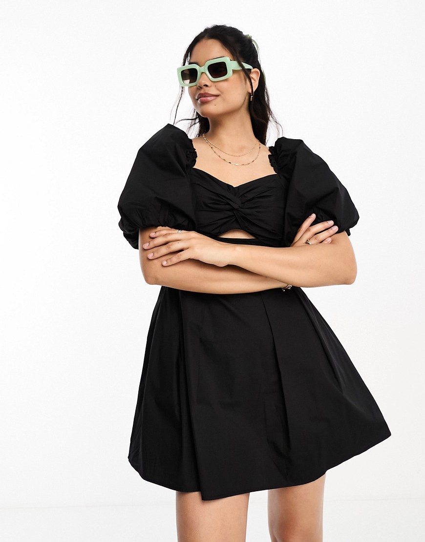 Moon River puff sleeve cut out mini dress in black