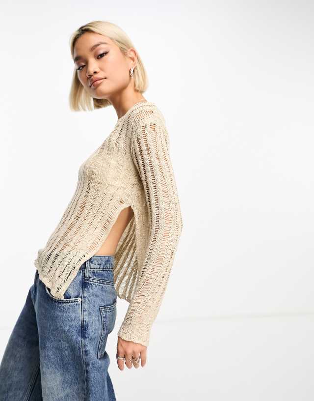 Moon River - side slit asymmetrical hem long sleeve knitted top in oatmeal