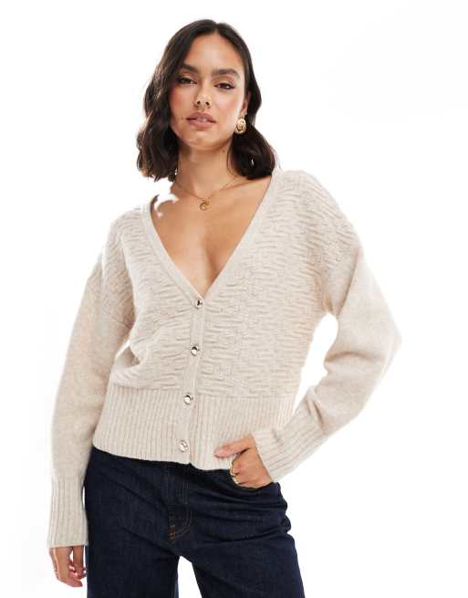 Morgan - Beige og strikket cardigan med ballonærmer og gennemgående knapper