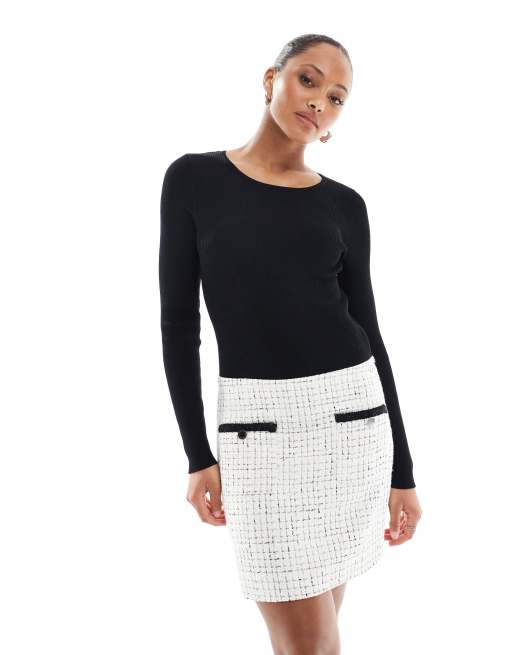 Morgan - Robe trapèze courte en tweed avec poches contrastantes et manches longues - Noir et blanc