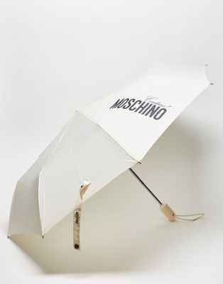 Moschino couture umbrella in cream