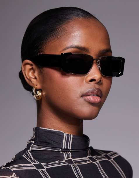 Moschino – Eckige Sonnenbrille in Schwarz und Gold - view 1