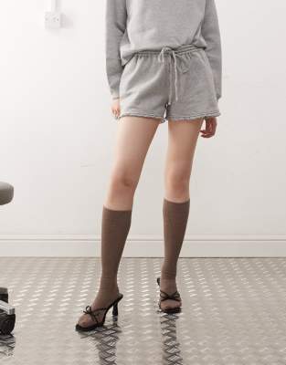 Shop Motel Agusta Ruffle Hem Shorts In Gray