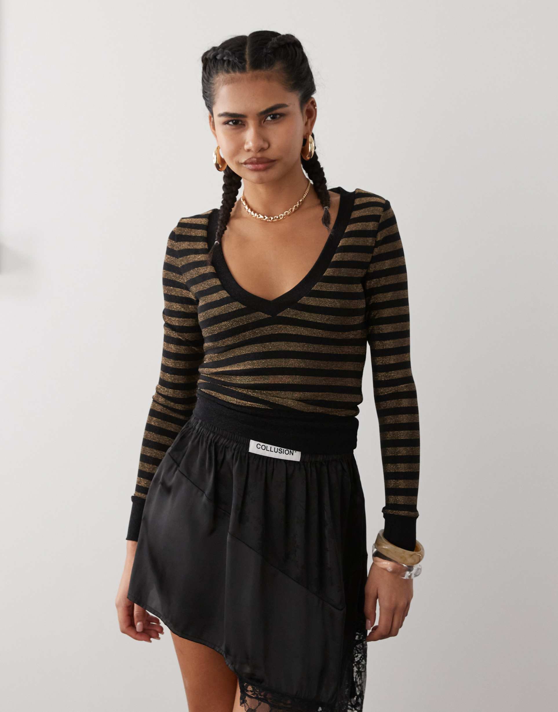 motel annora long sleeve knit top in gold stripe