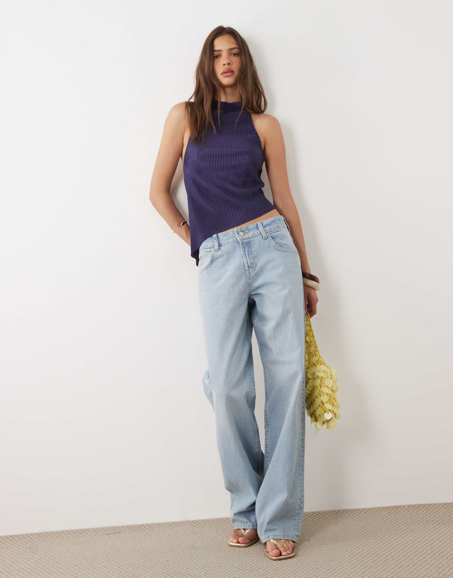 motel atsila high neck sleeveless plisse asymmetric top in navy