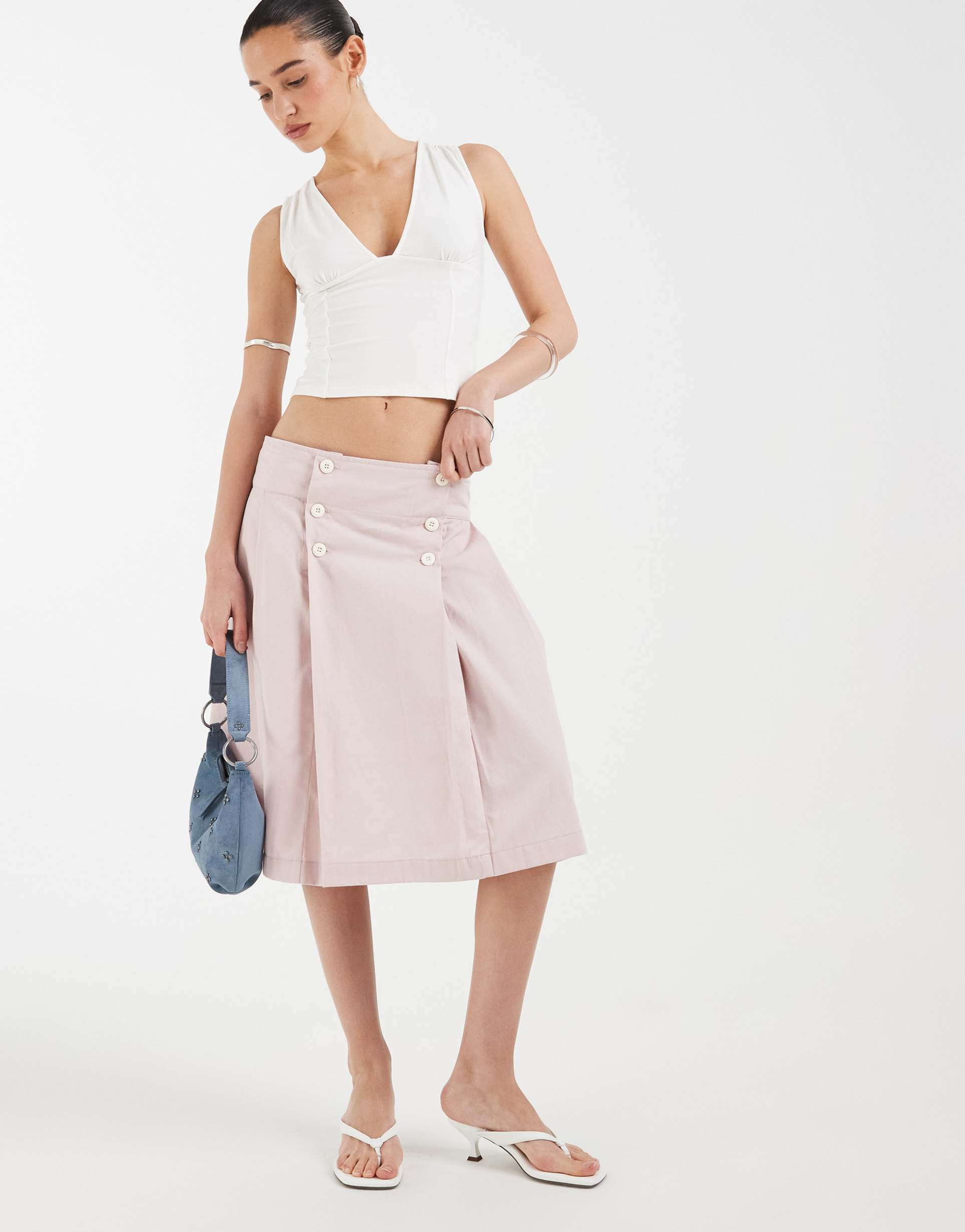 motel babete pleat skirt in sakura pink
