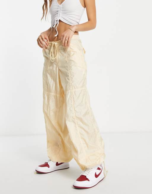 Motel baggy parachute pants in ecru