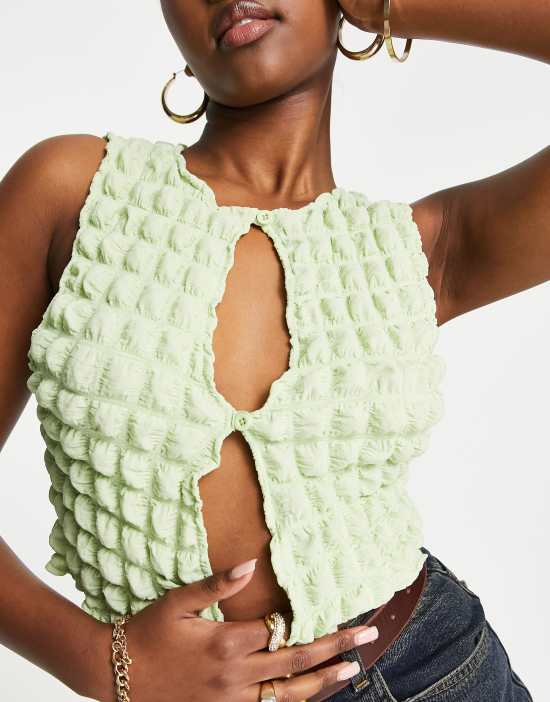 https://images.asos-media.com/products/motel-cut-out-button-front-crop-top-in-lime-bubble/202629099-1-limebubblejersey?$n_550w$&wid=550&fit=constrain