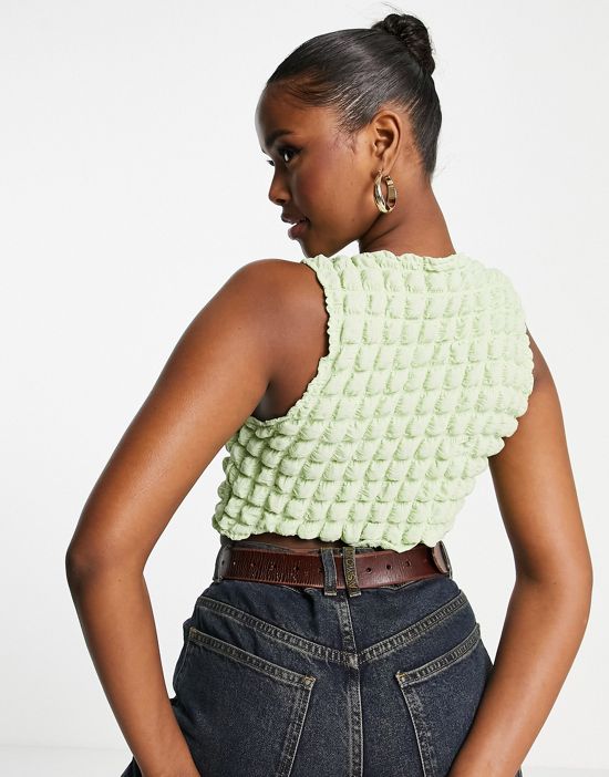 https://images.asos-media.com/products/motel-cut-out-button-front-crop-top-in-lime-bubble/202629099-2?$n_550w$&wid=550&fit=constrain