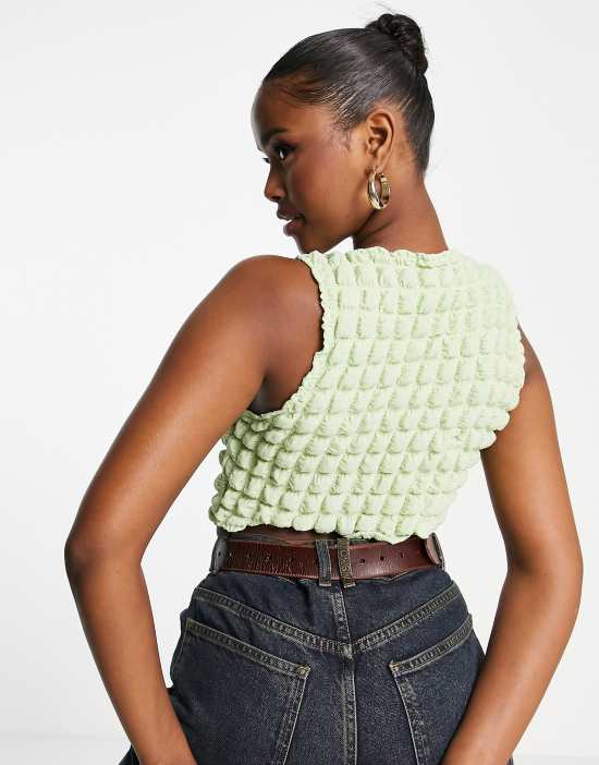 https://images.asos-media.com/products/motel-cut-out-button-front-crop-top-in-lime-bubble/202629099-2?$n_550w$&wid=550&fit=constrain