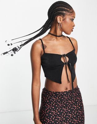 Motel cut out strap detail cami crop top in black - ASOS Price Checker