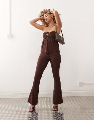 dan low-rise broderie flares in brown