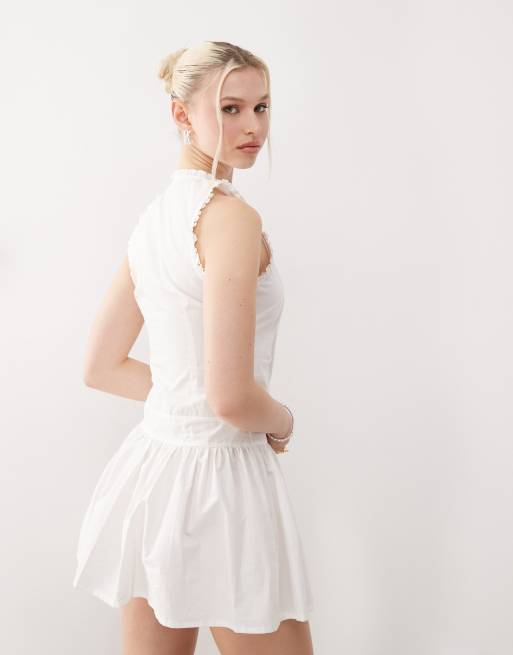 Motel Dayara pintuck mini dress in white