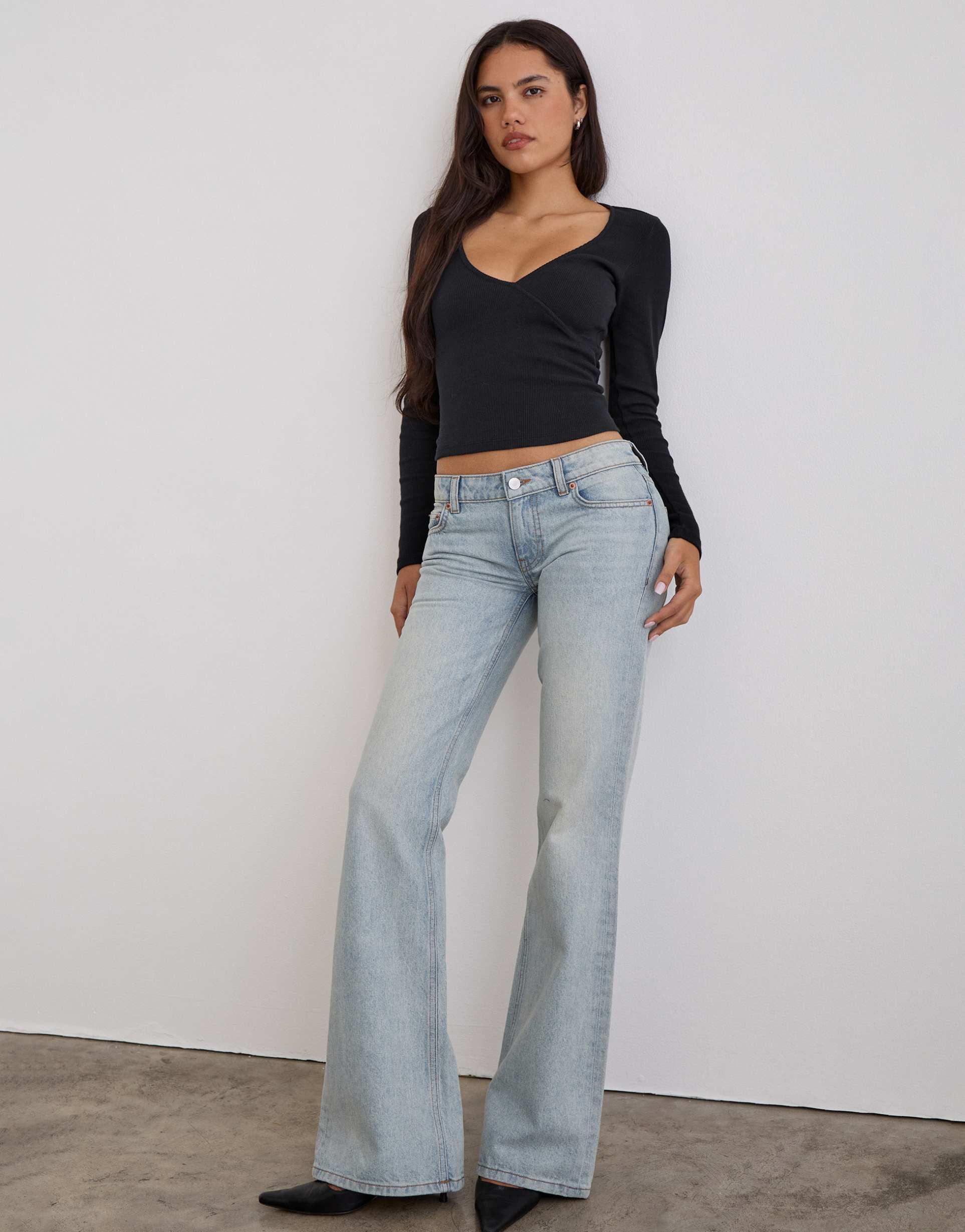 motel extra low rise flared jeans in breeze blue wash