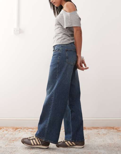 Motel extra wide low rise jeans in mid blue used wash