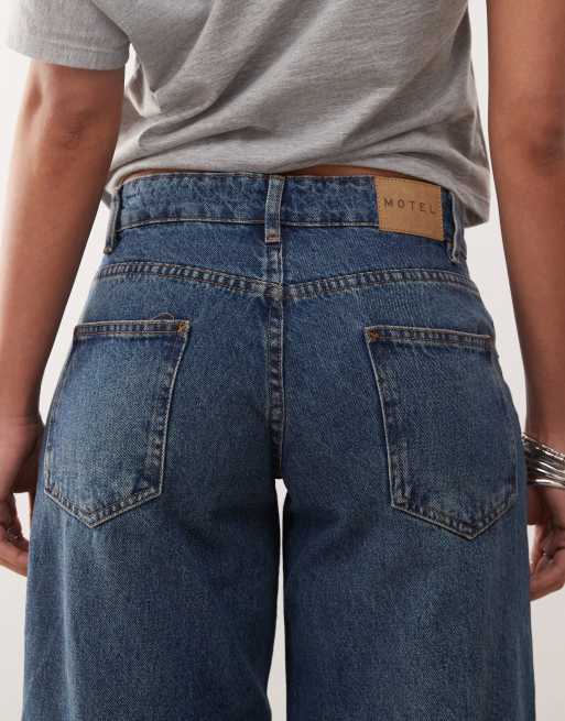 Motel extra wide low rise jeans in mid blue used wash