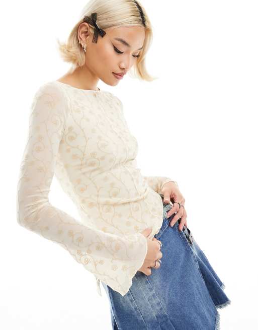 Motel flocked long sleeve asymmetric mesh top in cream