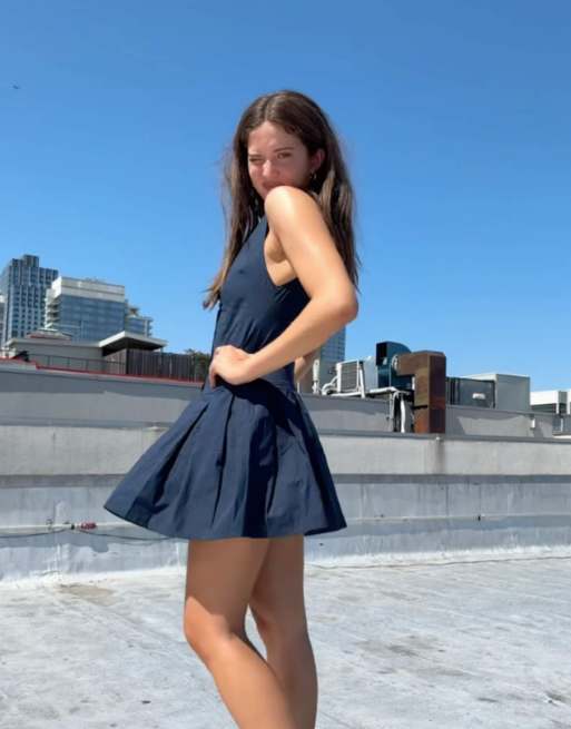 Navy dress with pleated skirt best sale