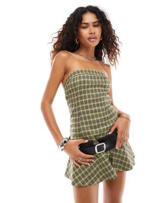 hadia drop waist mini dress in yellow plaid