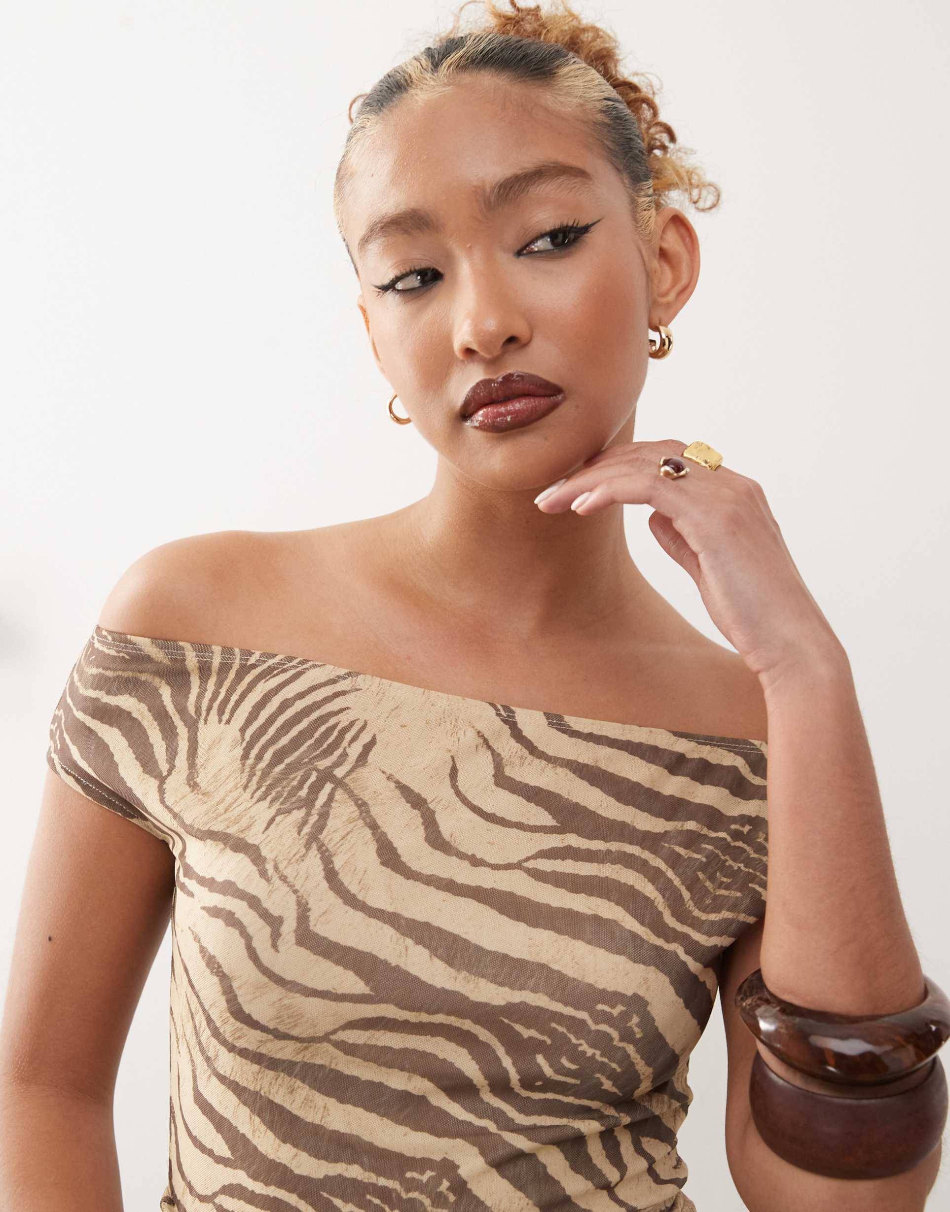 motel hari animal print dress in neutral