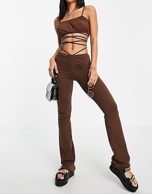 Motel high waisted flare trousers with waist tie co-ord