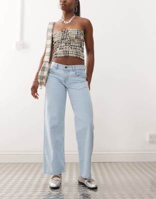 Motel - Jeans in hellblauer Waschung mit niedrigem Bund und geradem Schnitt