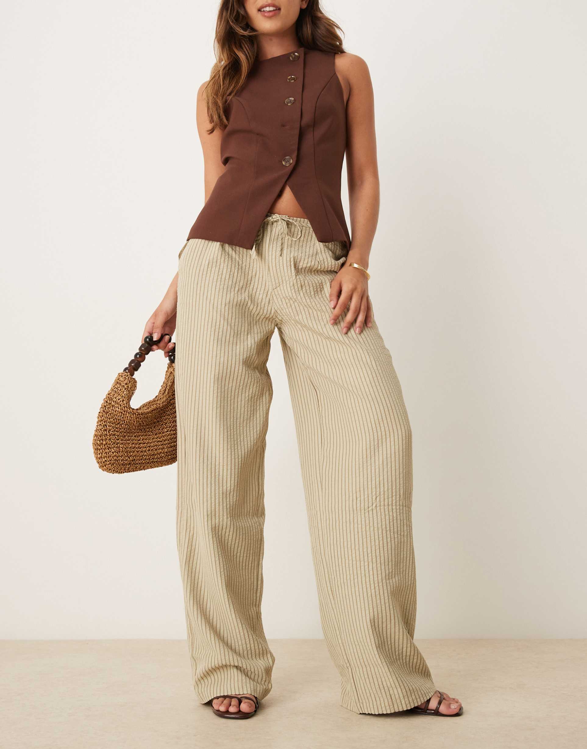 motel juria wide leg relaxed linen look pants in neutral khaki green stripes