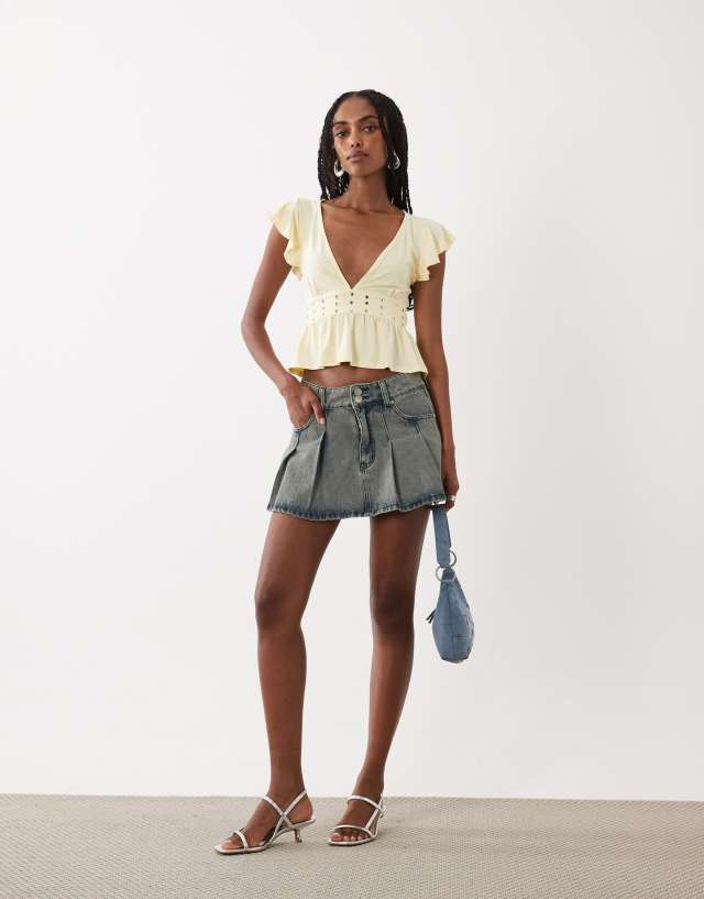 Motel Leisma studded frill plunge top in lemon | ASOS