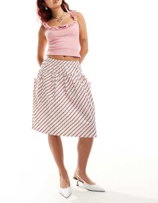 manasi checkerboard print midi skirt in multi