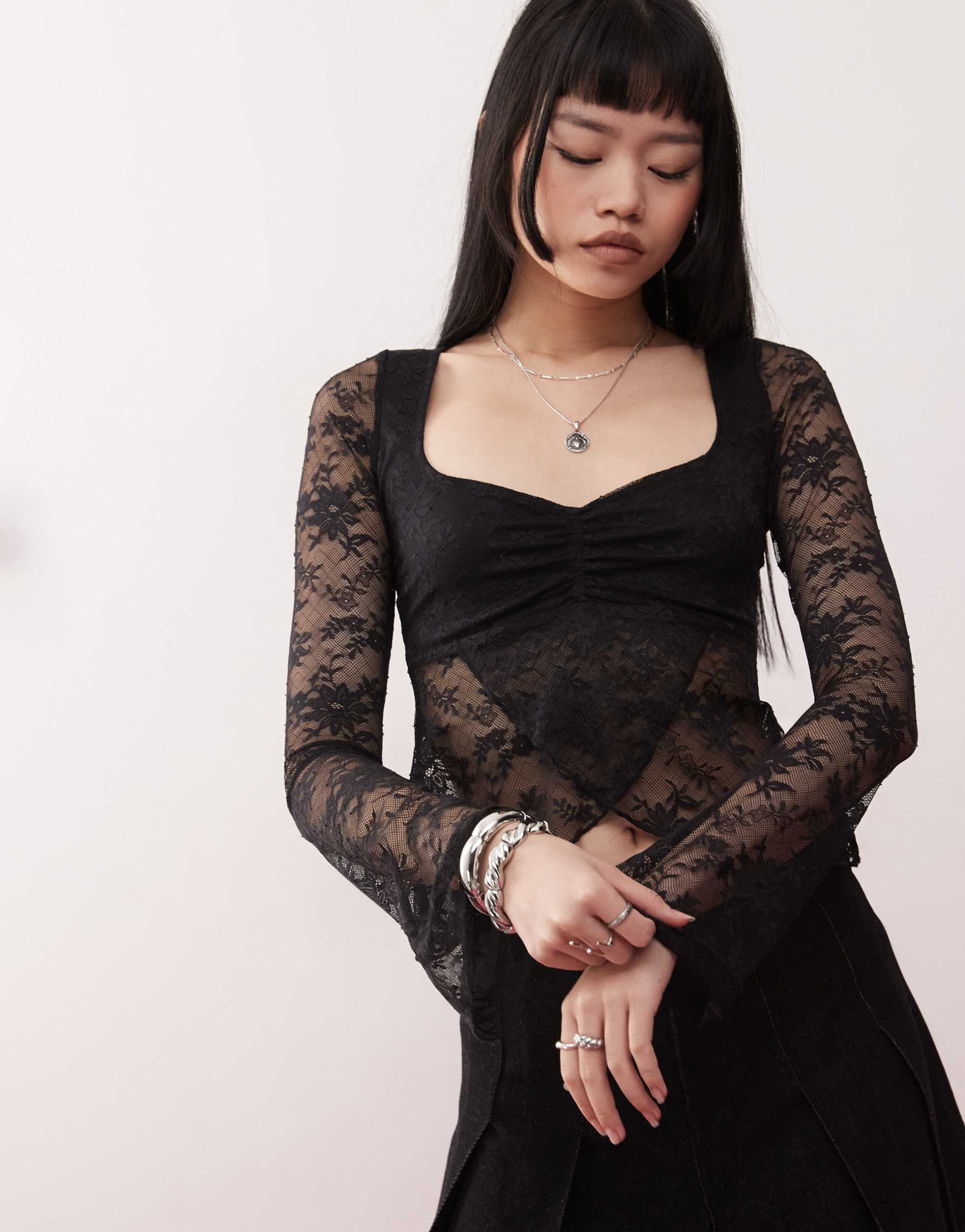 motel mandira long sleeve lace wrap over top in black