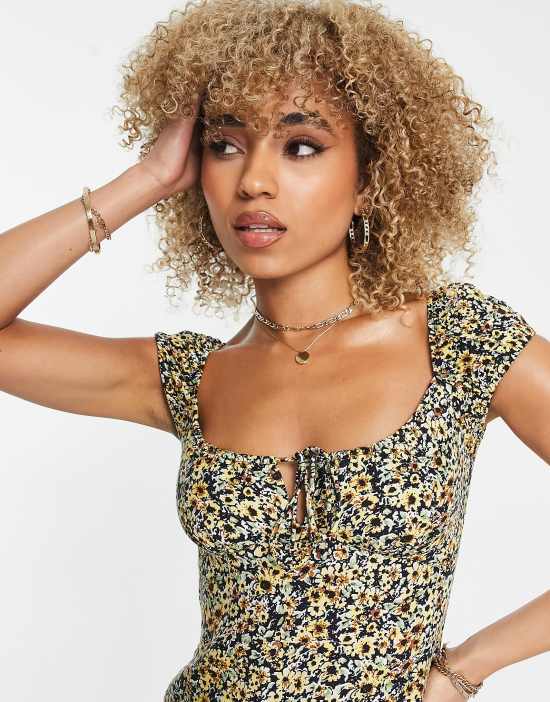 https://images.asos-media.com/products/motel-midi-milkmaid-tea-dress-with-thigh-split-in-grunge-yellow-floral/202388987-3?$n_550w$&wid=550&fit=constrain