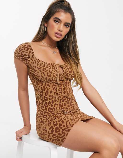 Motel mini dress with tie front in leopard print