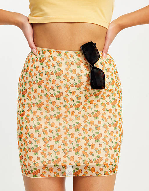 Motel mini skirt in summer floral mesh co-ord