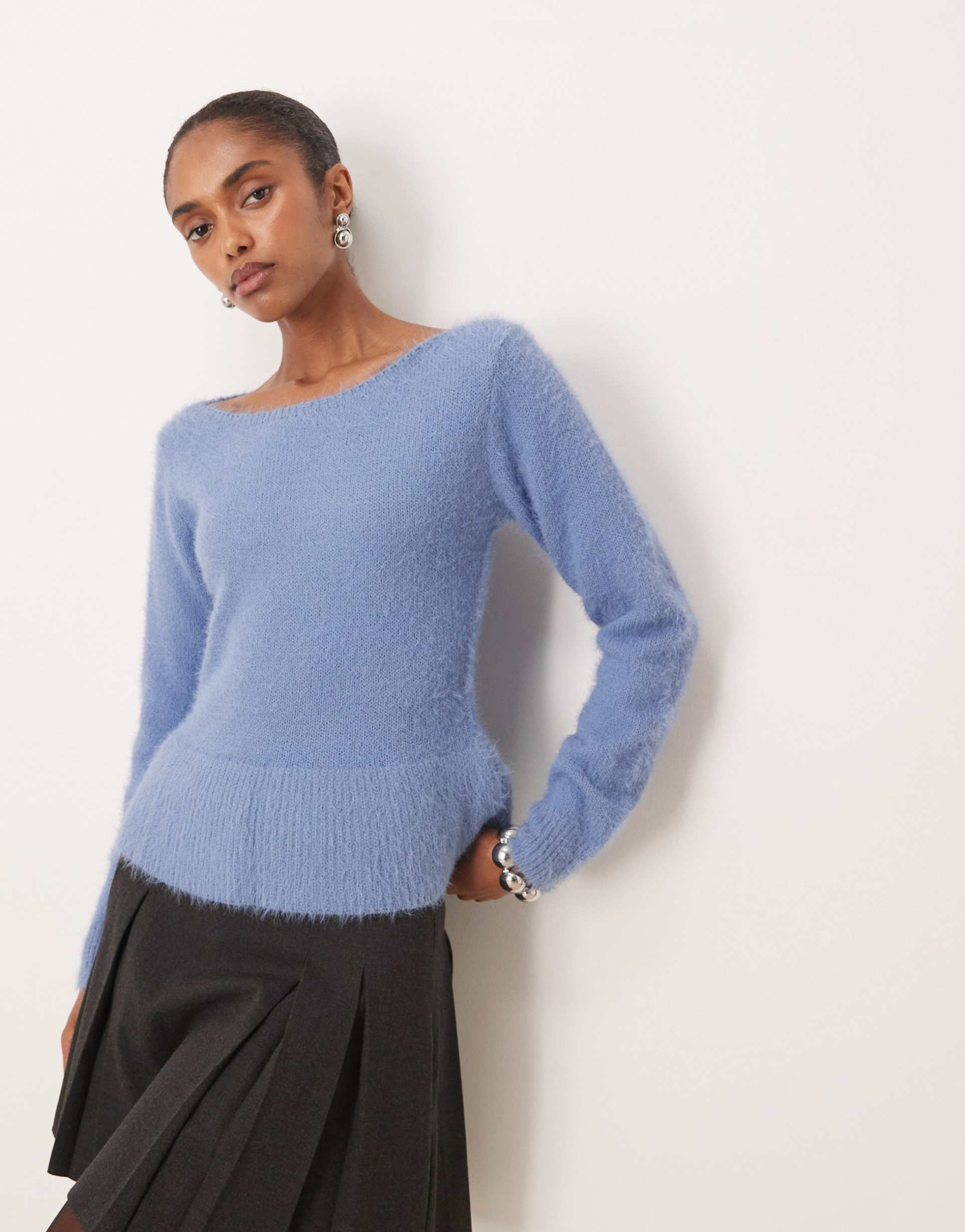motel mizuki ruffle hem sweater in dusty blue