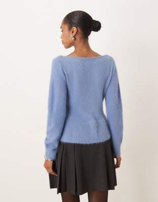 Motel Mizuki Ruffle Hem Sweater In Blue