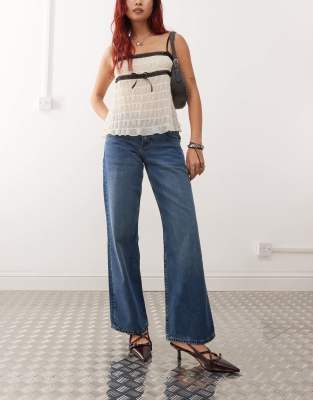 Motel - Parallel - Jeans in Used-Mittelblau mit niedrigem Bund