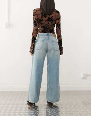 Shop Motel Roomy Extra Wide Low Rise Jeans In Blue