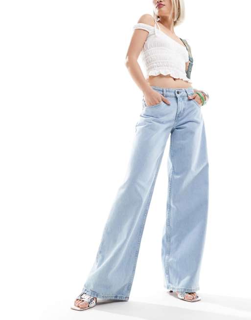 Motel roomy wide leg low rise jeans in light wash blue