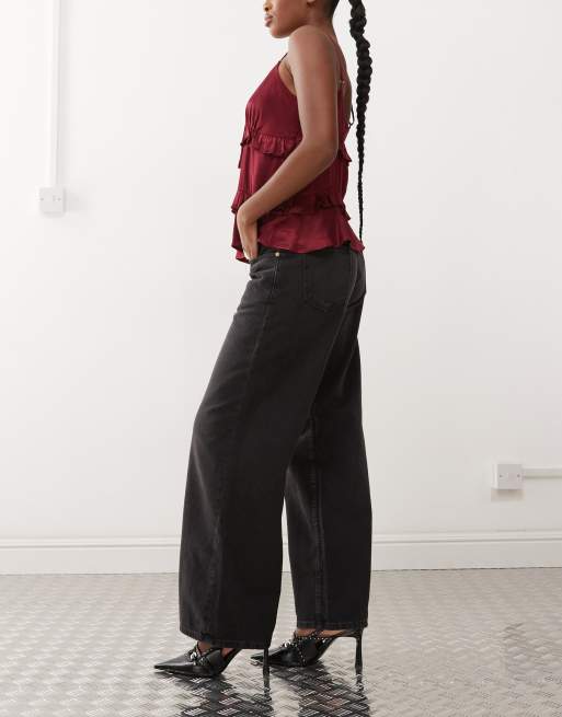 Motel roomy wide leg low rise jeans in washed black