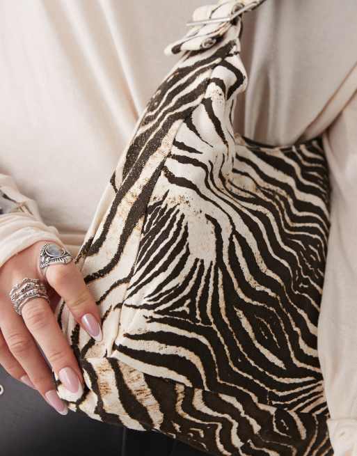 Motel Roscoe wild animal print bag in cream and brown, 2 of 4
