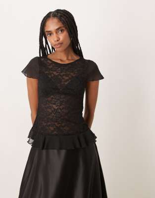 Motel - Roselani - Netzstoff-Oberteil in Schwarz mit Spitze und Rüschenkante